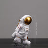 Carefree Astronaut Figurines